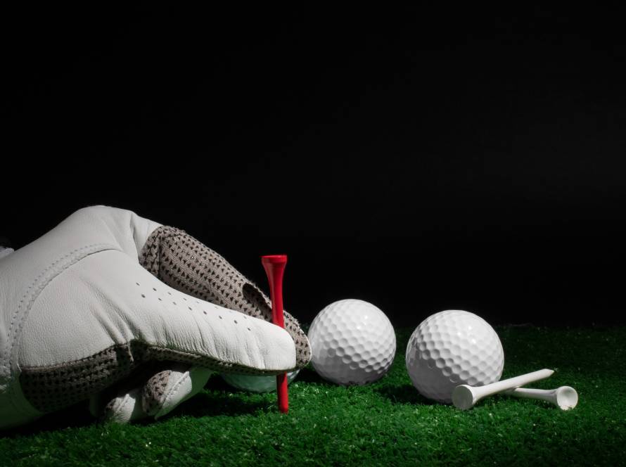 Golfer refining swing technique at an indoor golf simulator in Vancouver.